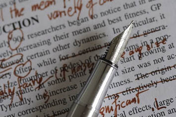Fountain pen on text with copyediting marks